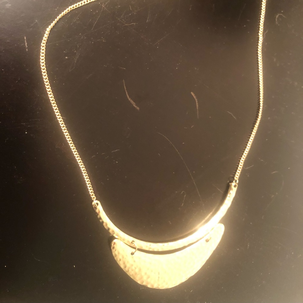 Gold tone moon necklace